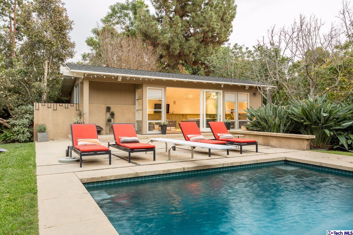 900 Hillcrest Place Pasadena, CA 91106 - Photo 34 of 40 swimming pool with outdoor seating and trees in the background