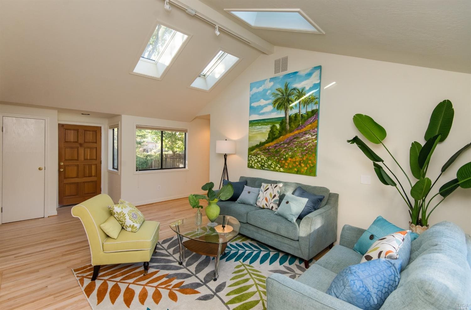 653 Carr Avenue Santa Rosa, CA 95404 - Photo 1 of 1 a living room with furniture and wooden floor