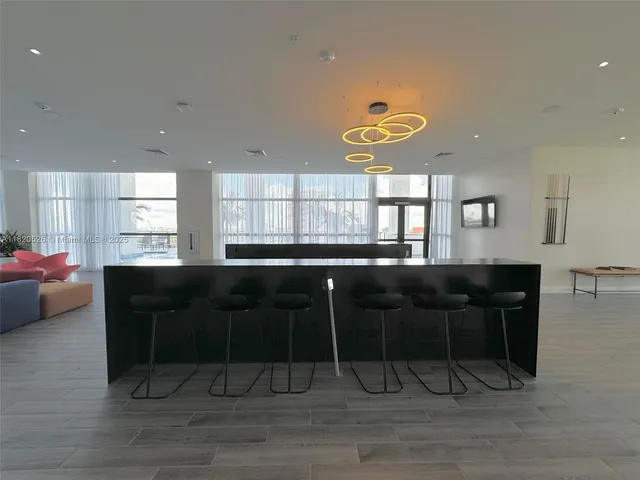 a living room with a couch and a table