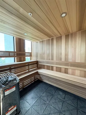 a bathroom with a bathtub and a window