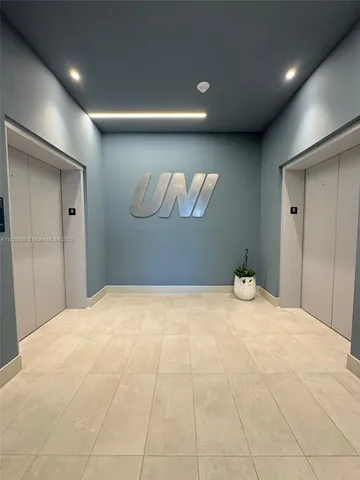 a view of a livingroom with a staircase