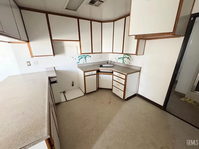 a room with table and chairs