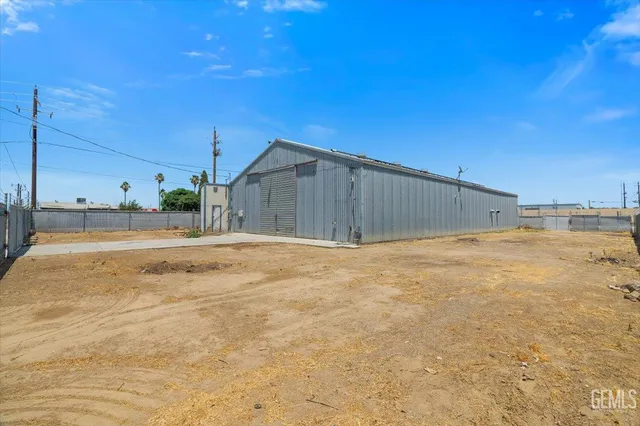 a view of a backyard of a house