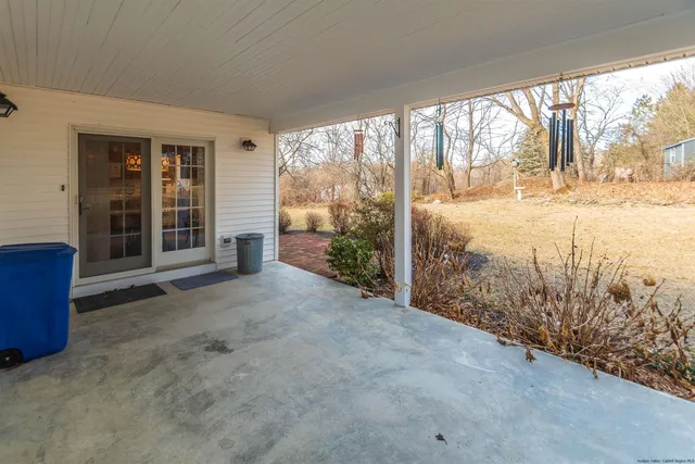 a view of a room with a large window