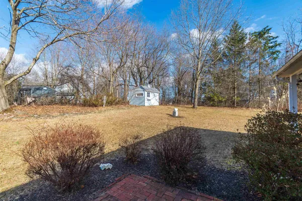 a view of yard covered with snow