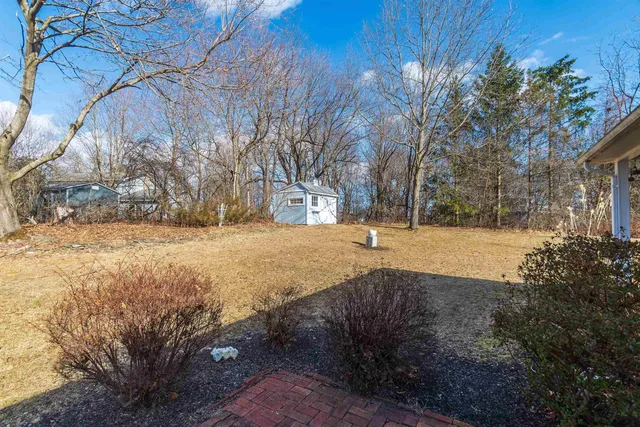 a view of yard covered with snow