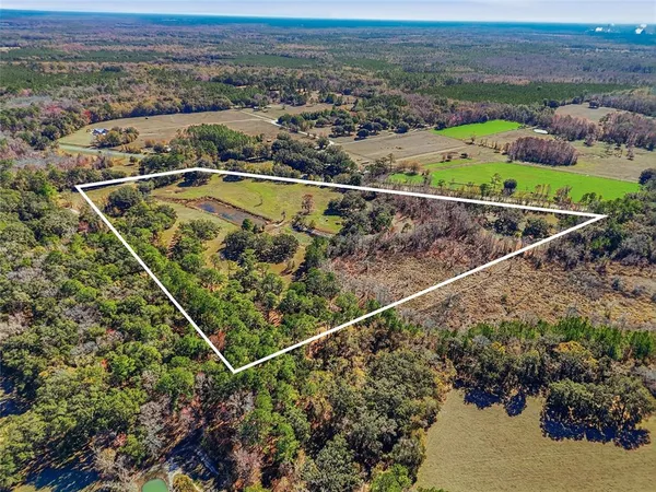 a view of a city with mountains in the background
