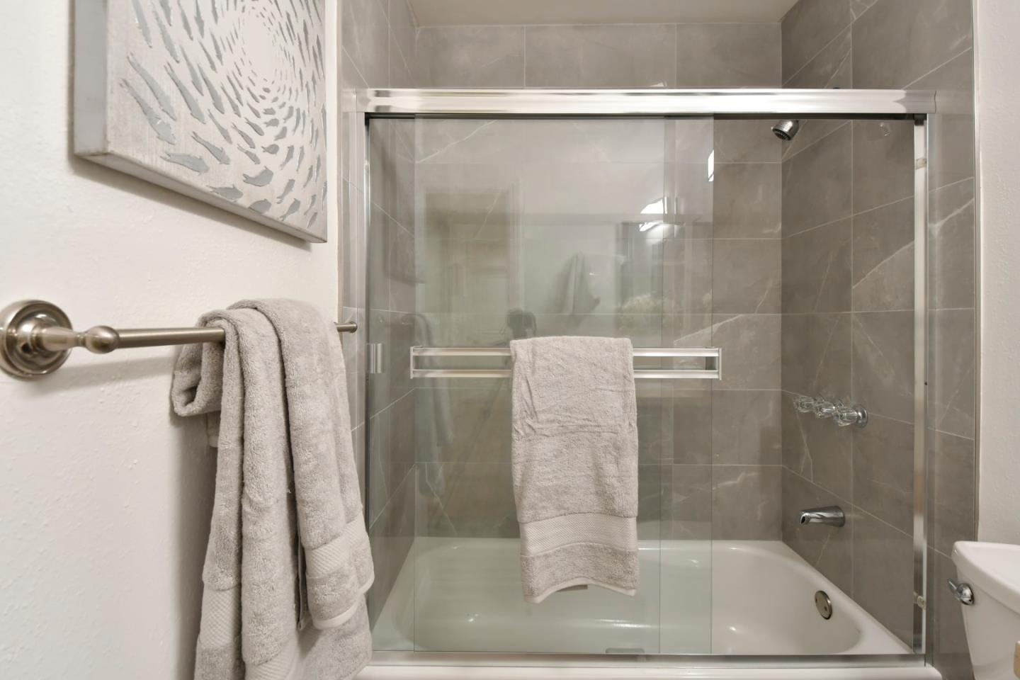 22059 McClellan Road Cupertino, CA 95014 - Photo 29 of 40 a bathroom with a shower