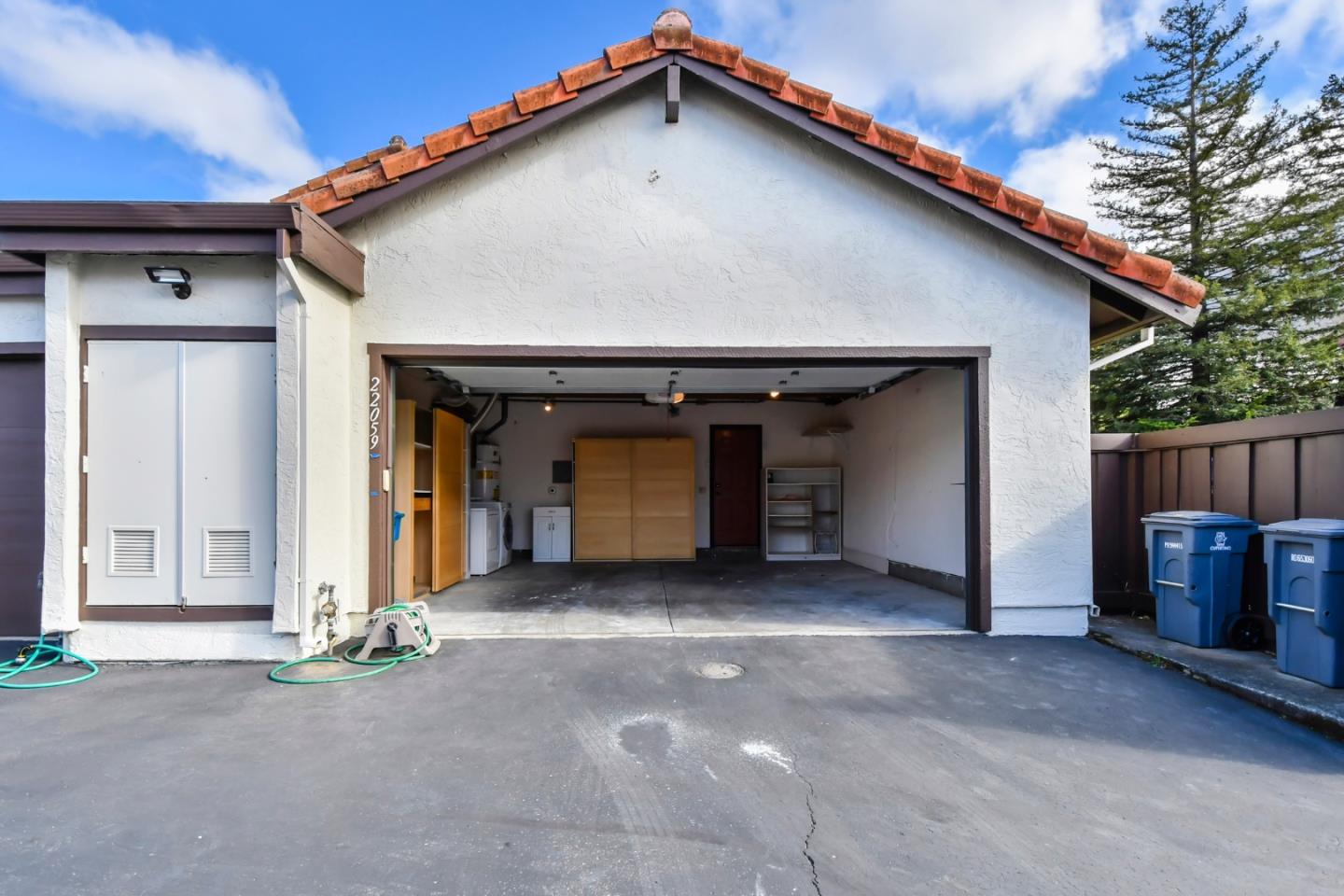 22059 McClellan Road Cupertino, CA 95014 - Photo 31 of 40 a view of a house with wooden walls