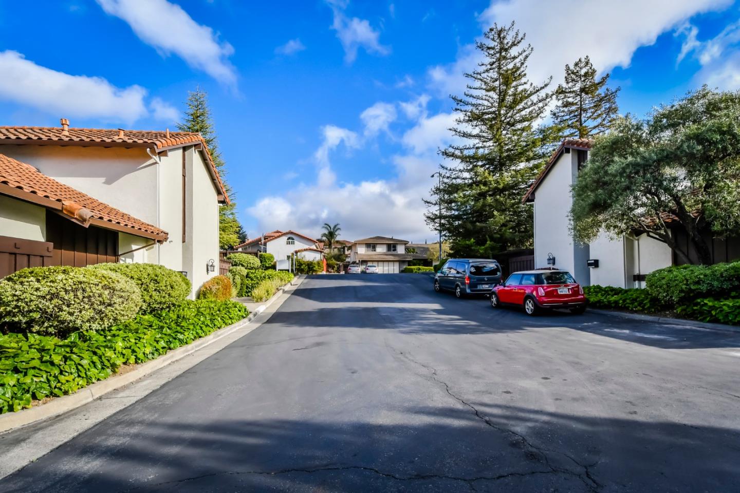 22059 McClellan Road Cupertino, CA 95014 - Photo 36 of 40 a view of a cars parked in front of a house