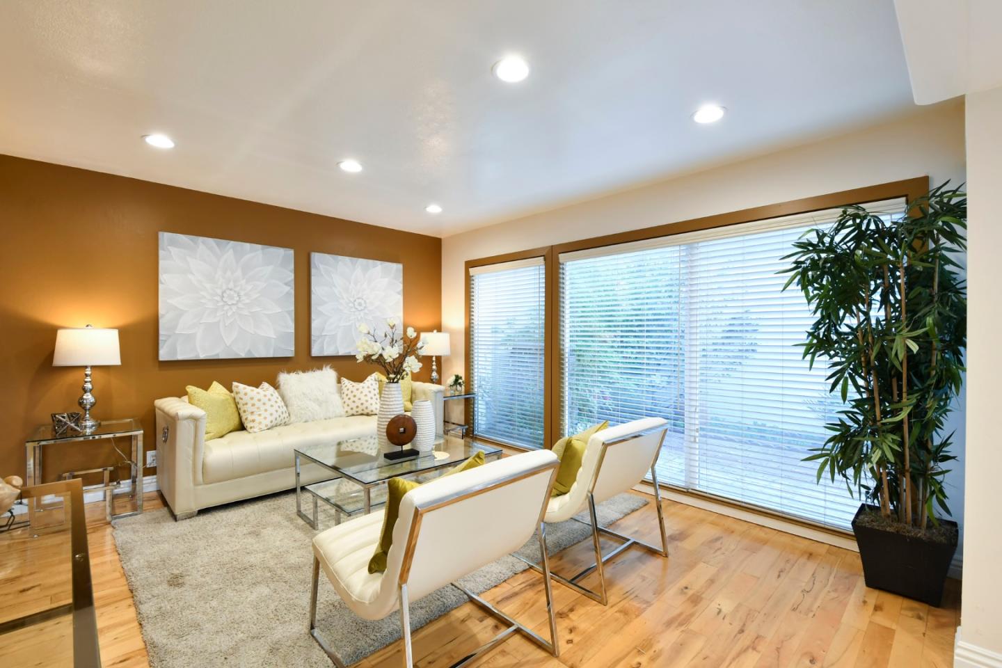 22059 McClellan Road Cupertino, CA 95014 - Photo 6 of 40 a living room with furniture and a large window