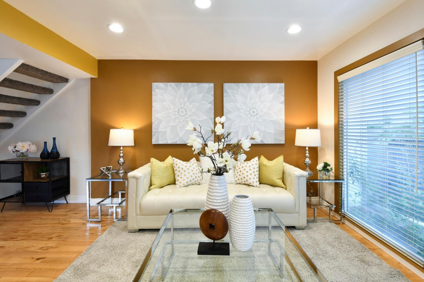 22059 McClellan Road Cupertino, CA 95014 - Photo 8 of 40 a living room with fireplace furniture and a large window