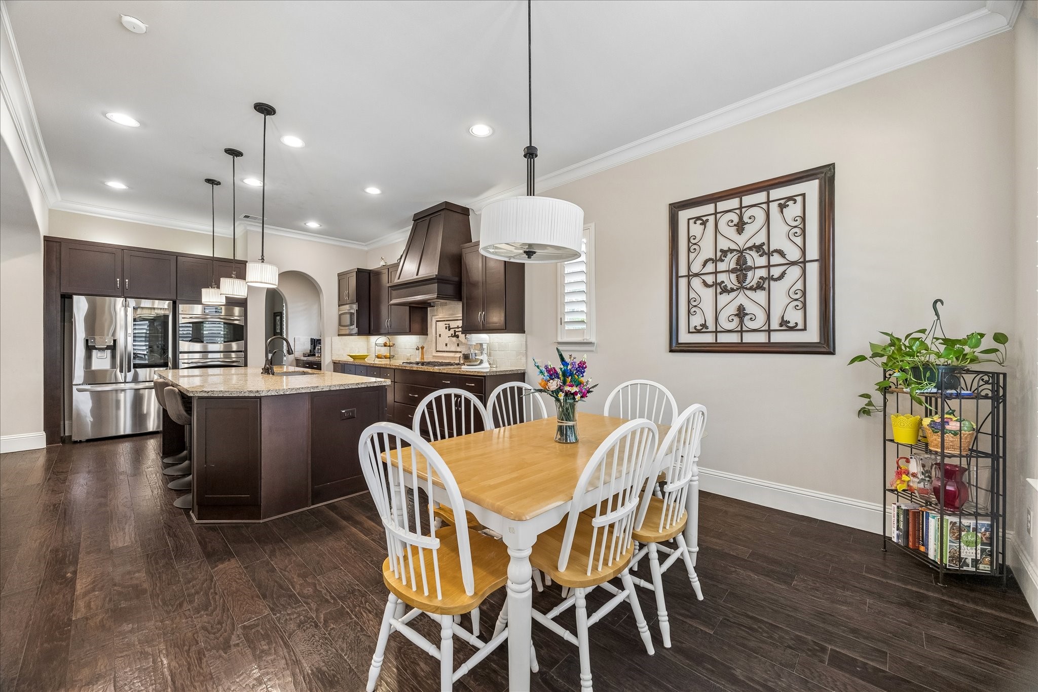 3 Tiburon Court Spring, TX 77389 - Photo 12 of 37 Spacious, open-concept kitchen and breakfast area with serene view of backyard.