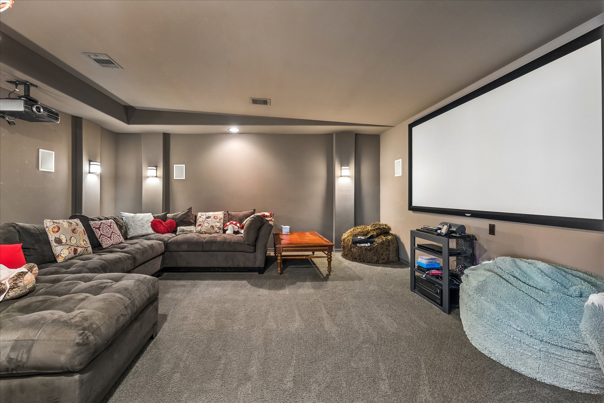 3 Tiburon Court Spring, TX 77389 - Photo 22 of 37 This cozy home theater features a large screen, and ambient wall lighting, perfect for movie nights.