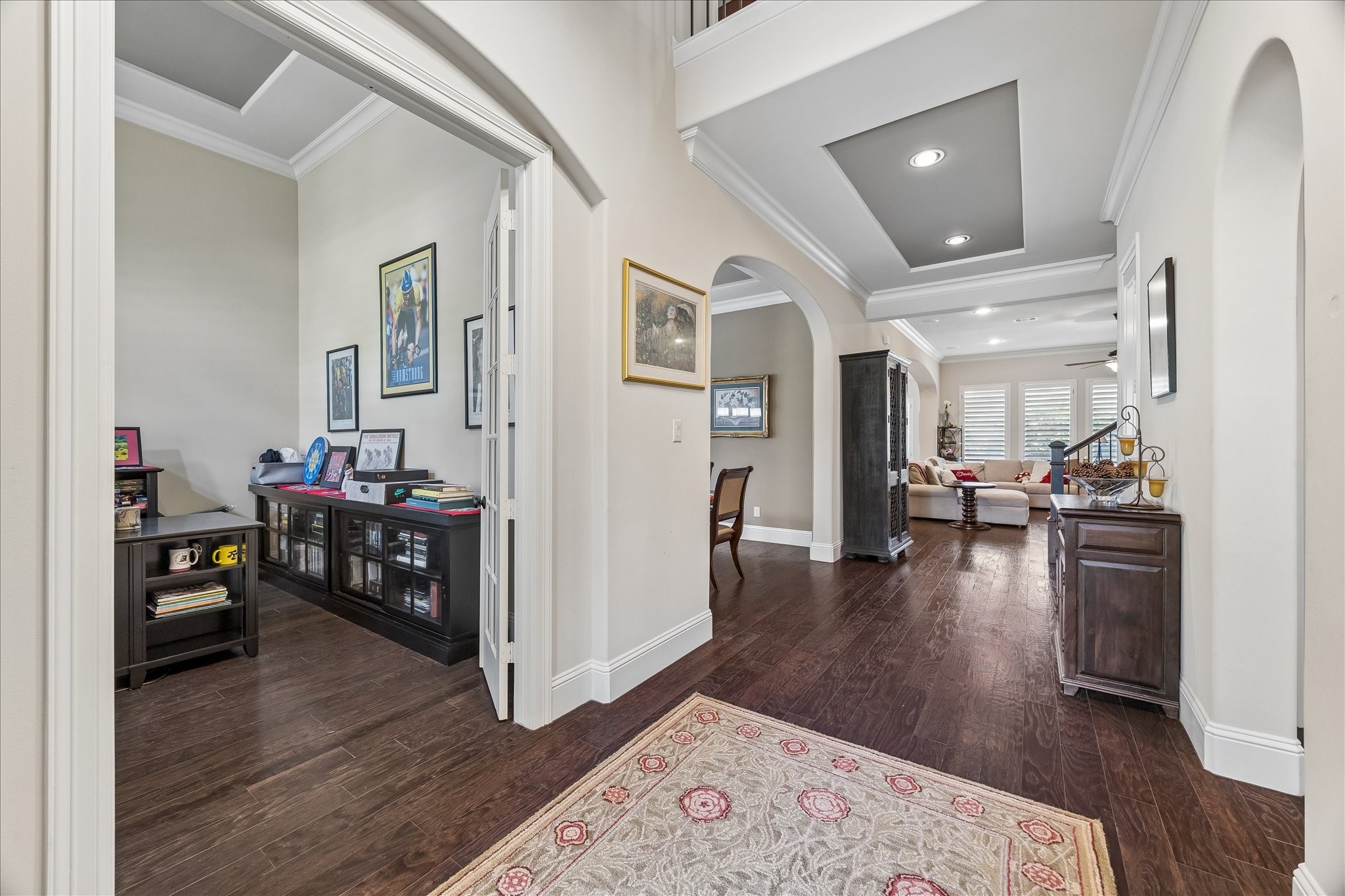 3 Tiburon Court Spring, TX 77389 - Photo 5 of 37 Large home office to the left as you enter the home. Arches, trayed ceiling and handsome flooring welcome you in!