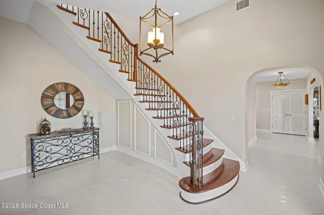 a kitchen with stainless steel appliances granite countertop a refrigerator sink and cabinets