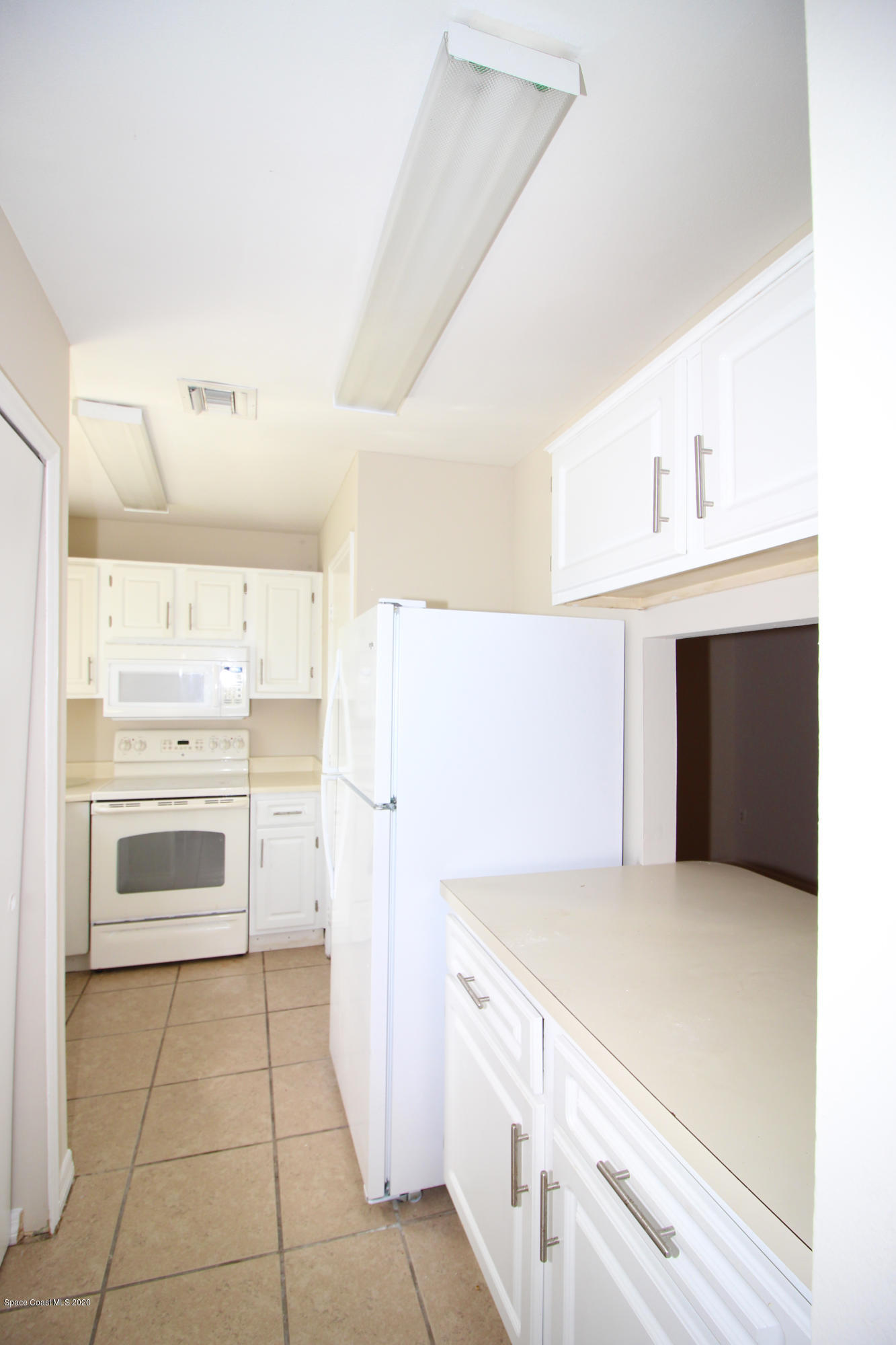280 Spring Drive, Unit 2 Merritt Island, FL 32953 - Photo 5 of 13 Spring Dr 280 U2 - IMG_2274