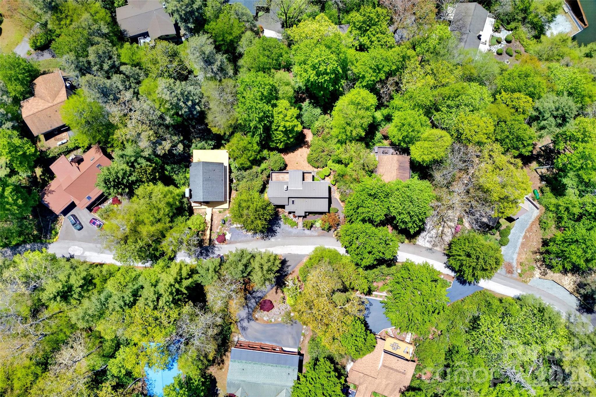 334 Harbor Lake Road Newland, NC 28657 - Photo 40 of 48 an aerial view of residential house with outdoor space and trees all around
