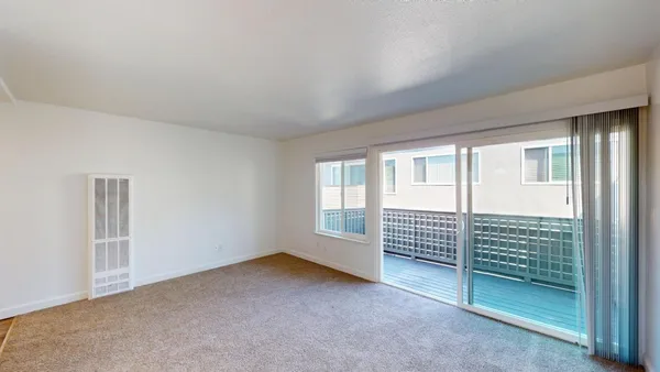 an empty room with windows