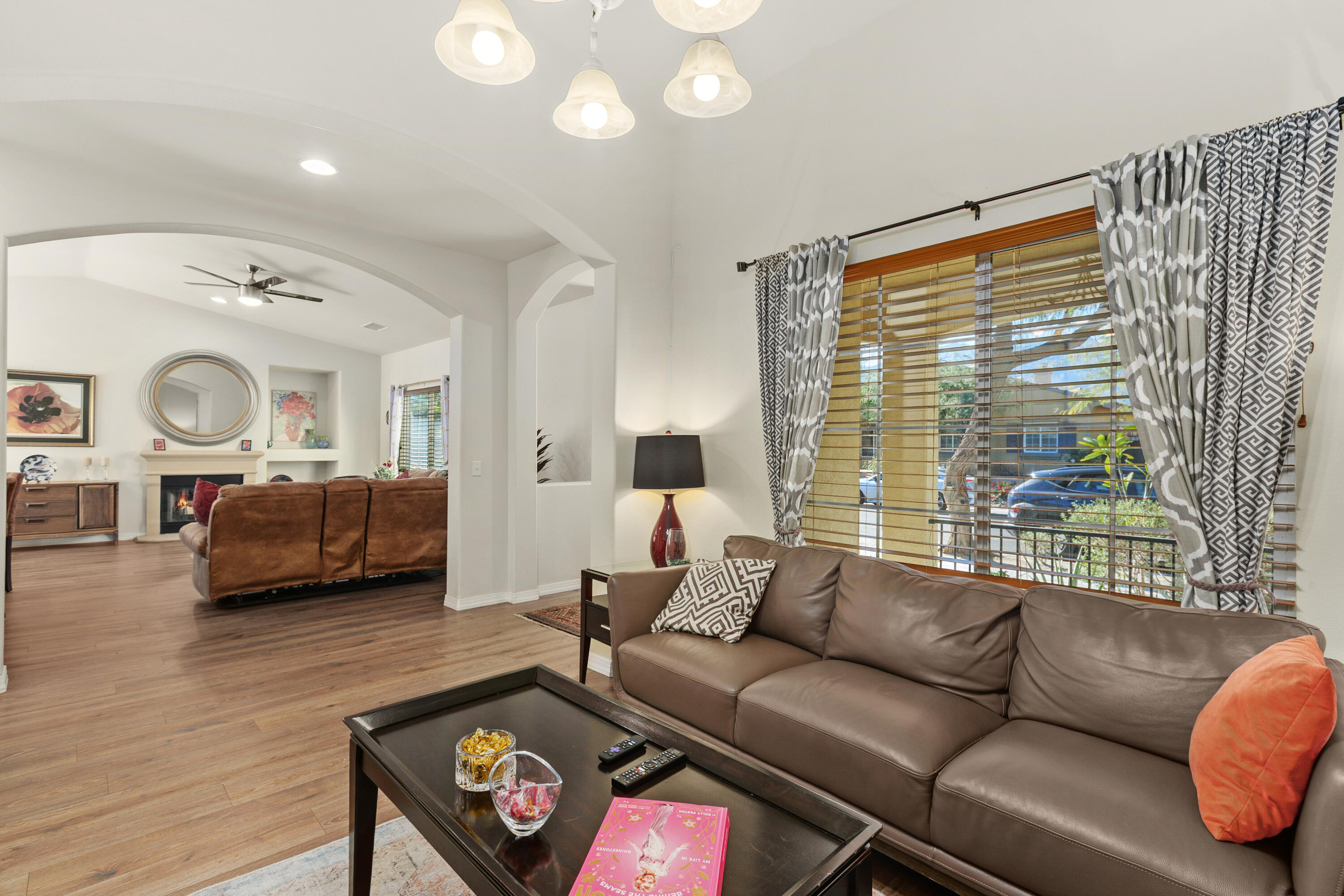 26700 Rio Dulce Road Cathedral City, CA 92234 - Photo 3 of 20 a living room with furniture and a large window