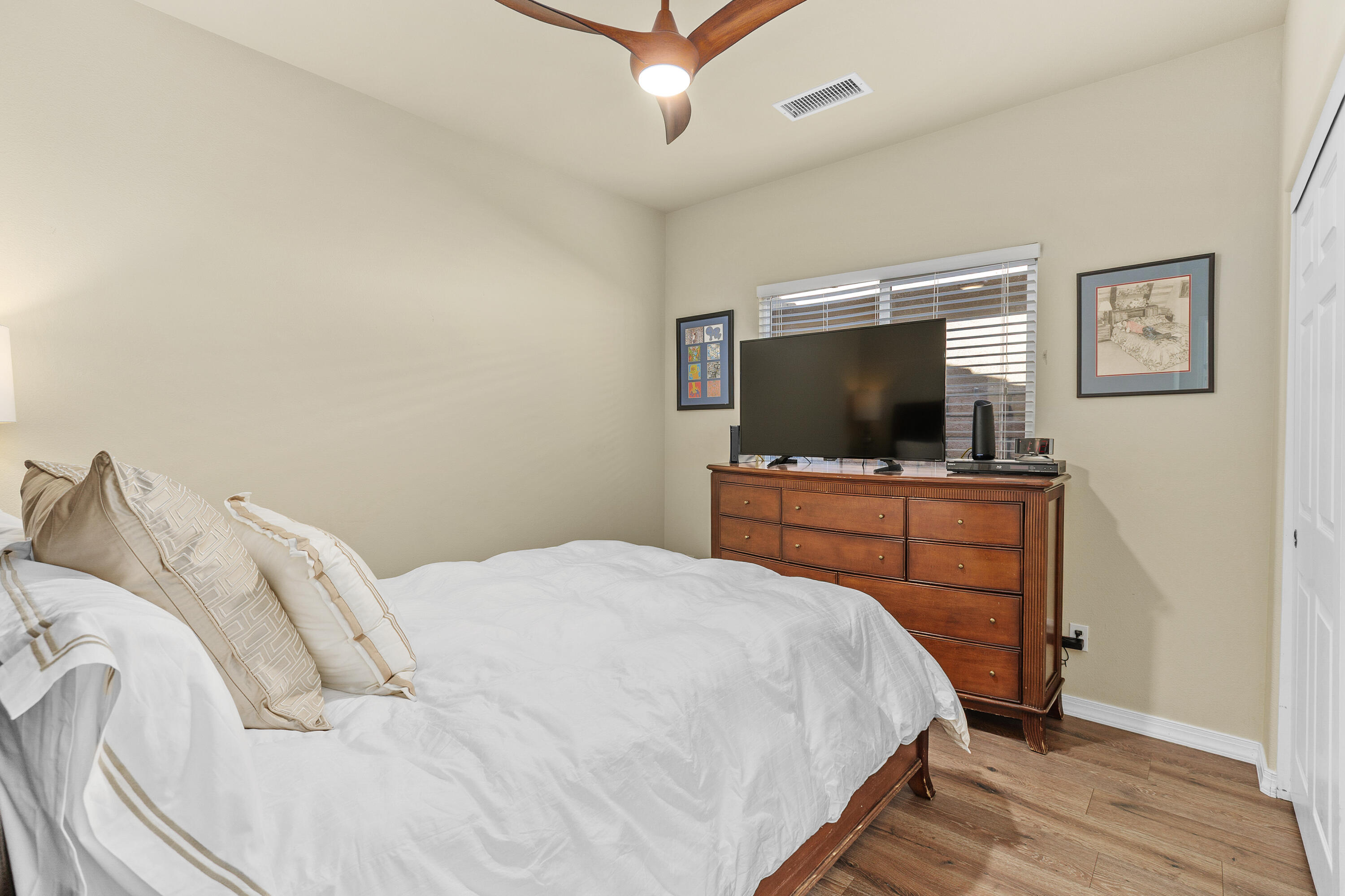 26700 Rio Dulce Road Cathedral City, CA 92234 - Photo 9 of 20 a bedroom with a bed and a flat screen tv