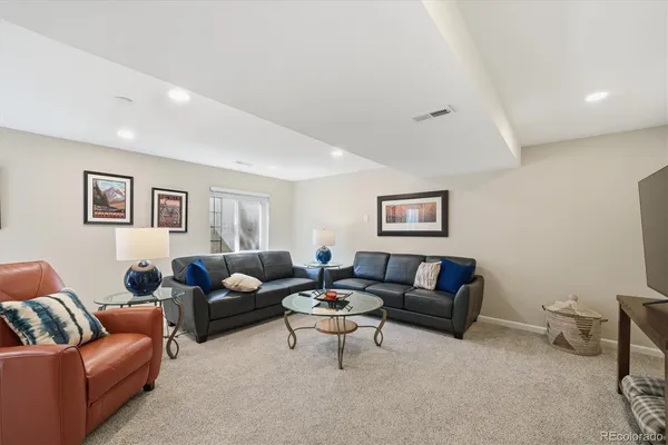 a living room with furniture and a couch