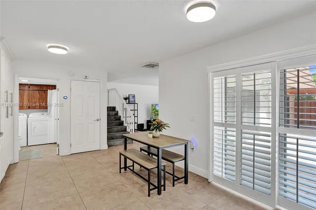 a room with furniture and a window