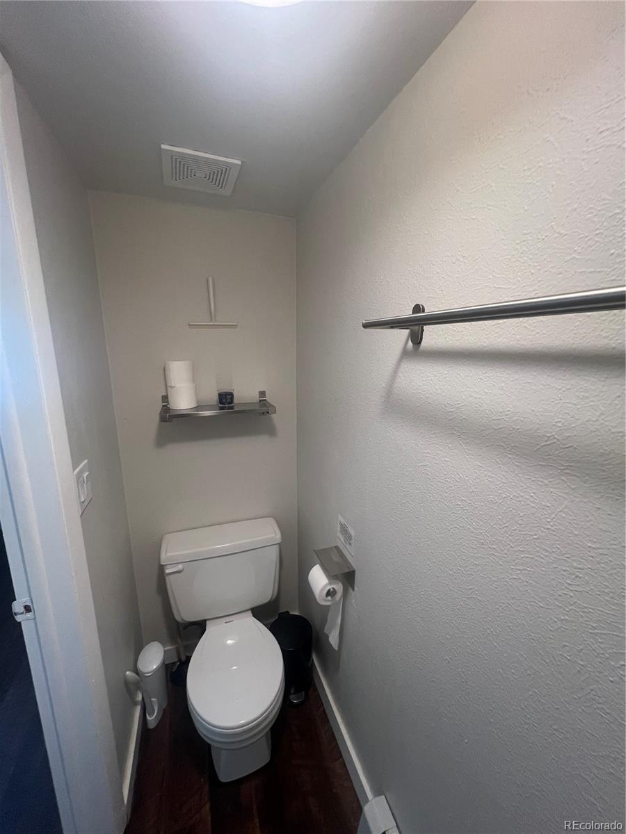 9876 Ryan Gulch Road, Unit 104 Silverthorne, CO 80498 - Photo 14 of 15 a bathroom with a toilet