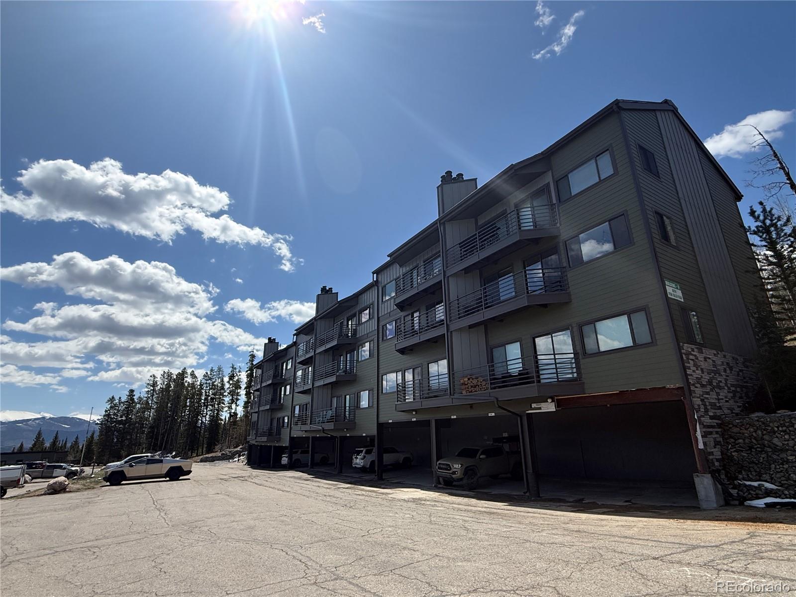 9876 Ryan Gulch Road, Unit 104 Silverthorne, CO 80498 - Photo 8 of 15 a front view of a building