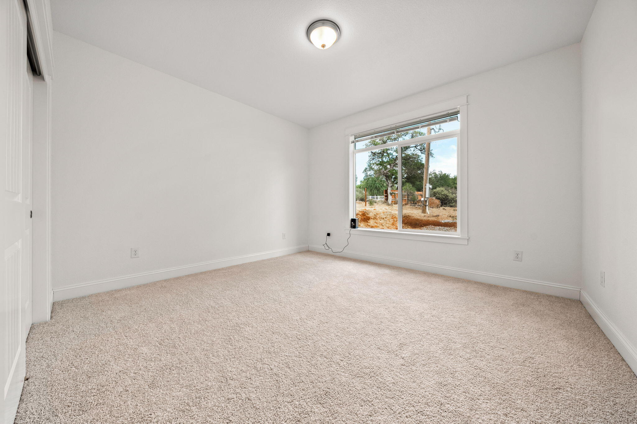7590 Hopeful Place Shingletown, CA 96088 - Photo 19 of 31 an empty room with windows