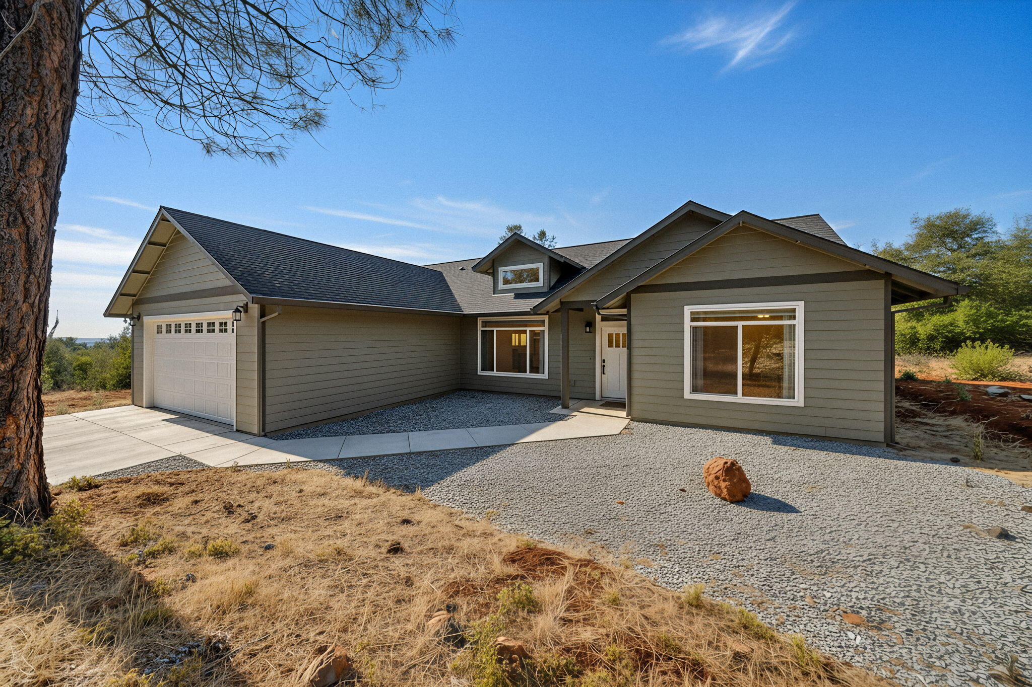 7590 Hopeful Place Shingletown, CA 96088 - Photo 28 of 31 a front view of a house with a yard