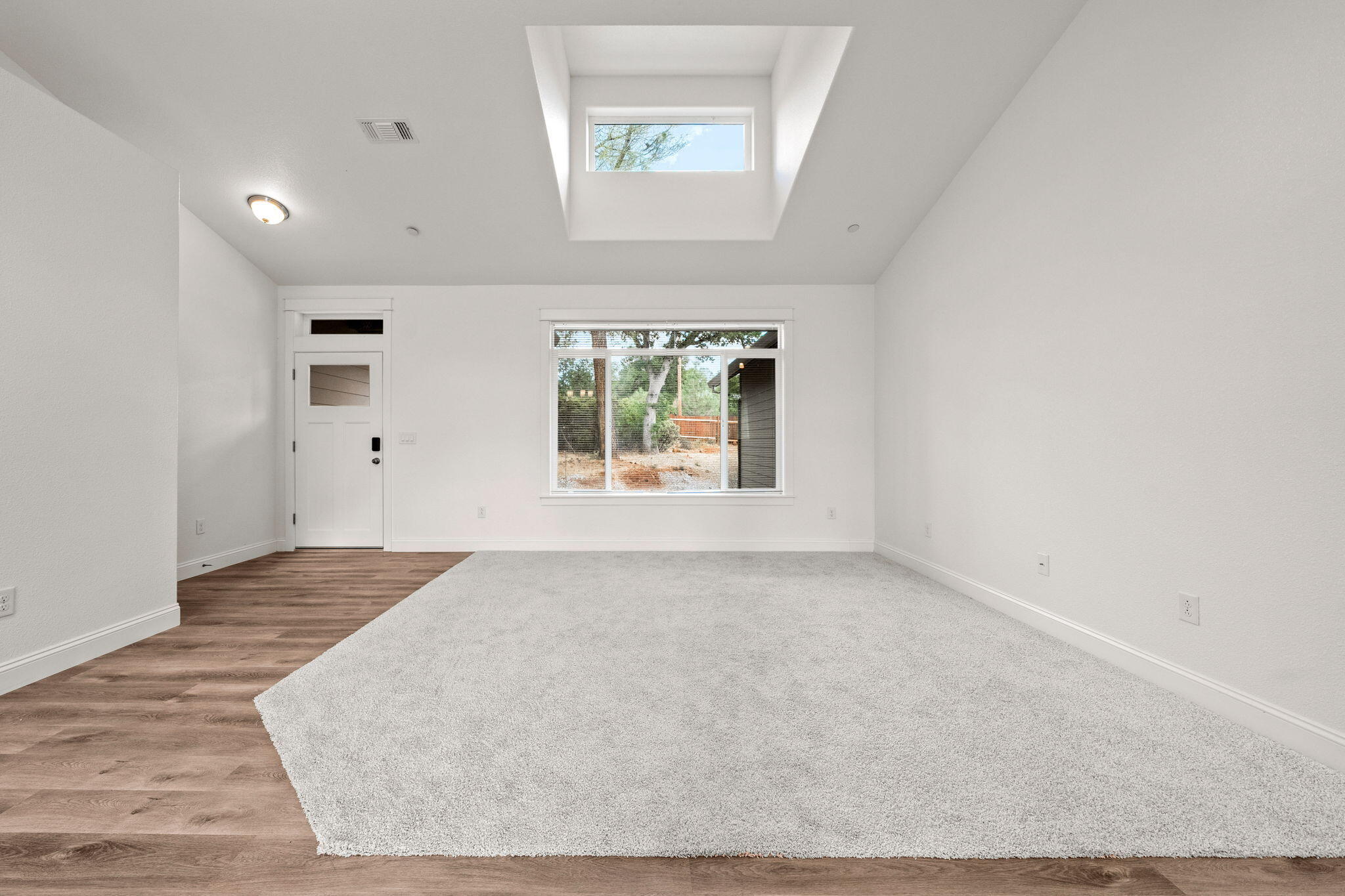 7590 Hopeful Place Shingletown, CA 96088 - Photo 4 of 31 an empty room with windows and closet