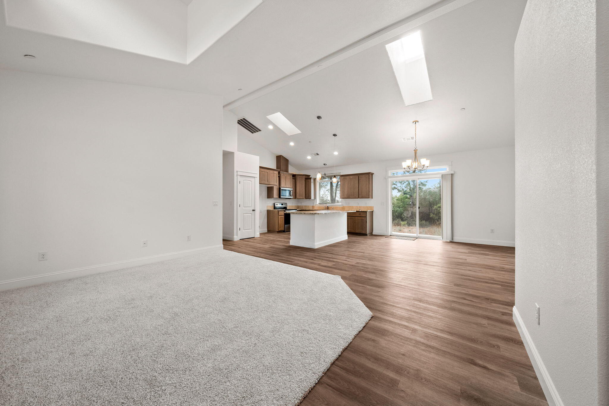 7590 Hopeful Place Shingletown, CA 96088 - Photo 5 of 31 a view of a kitchen with a sink and a window