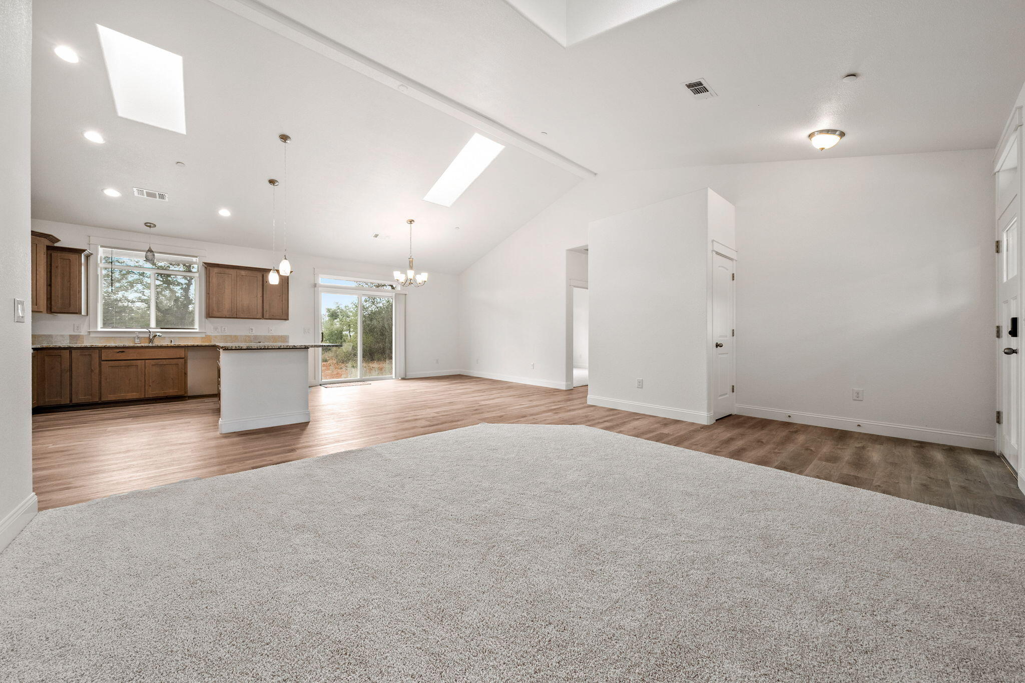 7590 Hopeful Place Shingletown, CA 96088 - Photo 6 of 31 a view of a kitchen with a sink and a stove top oven