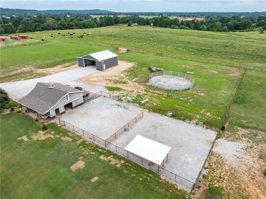 16556 East Hewitt Springs Road Springdale, AR 72764 - Photo 6 of 60 Expansive property featuring multiple outbuildings, fenced areas, and extensive open land