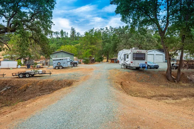 a backyard of a house with lots of green space