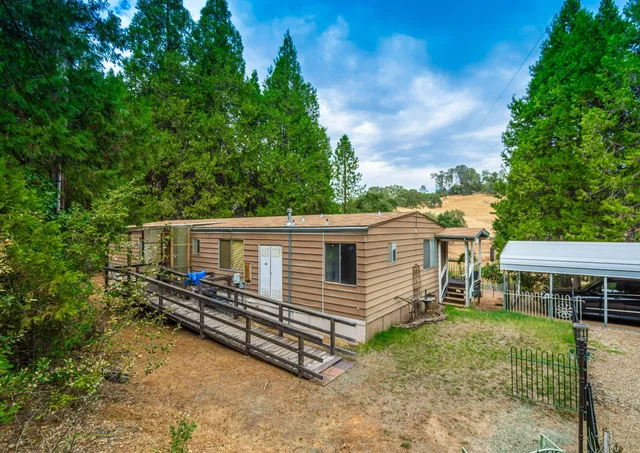 a view of backyard with green space