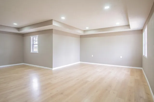 a view of an empty room and window