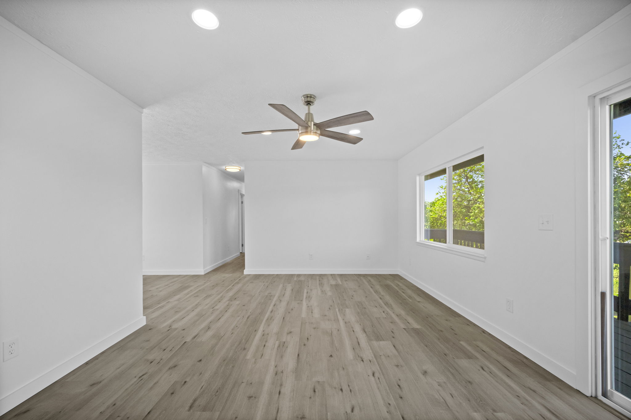 4431 Iona Road Hanapepe, HI 96705 - Photo 9 of 20 wooden floor in an empty room with a window
