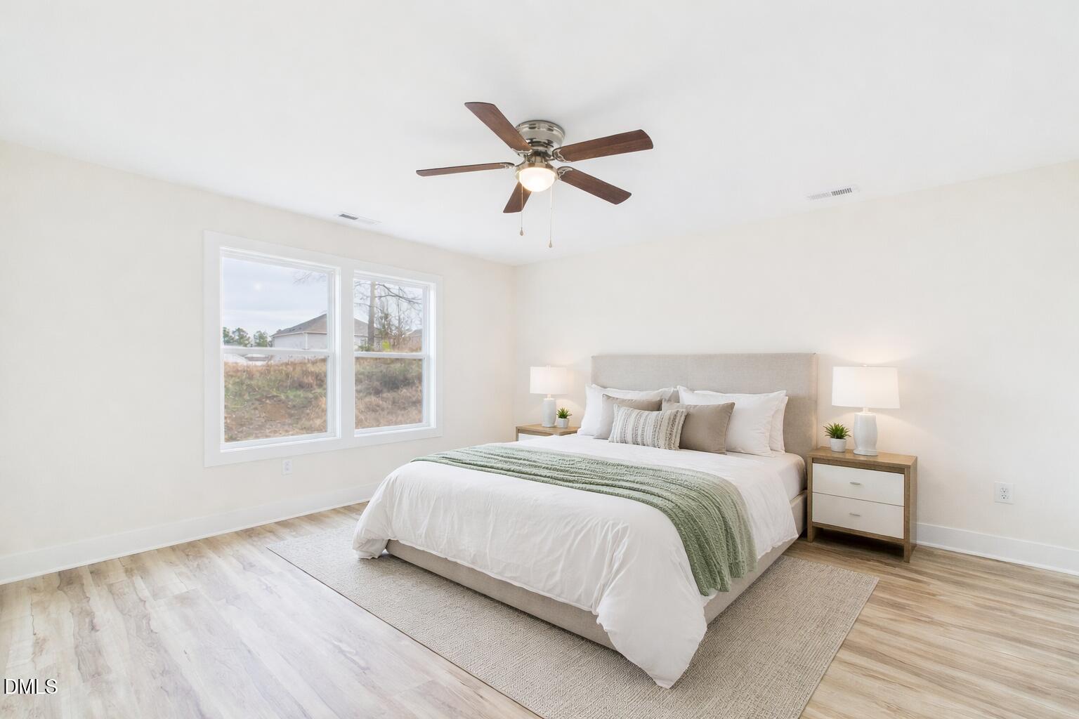 3602 Old Farm Court Graham, NC 27253 - Photo 12 of 25 a bedroom with a bed and a window