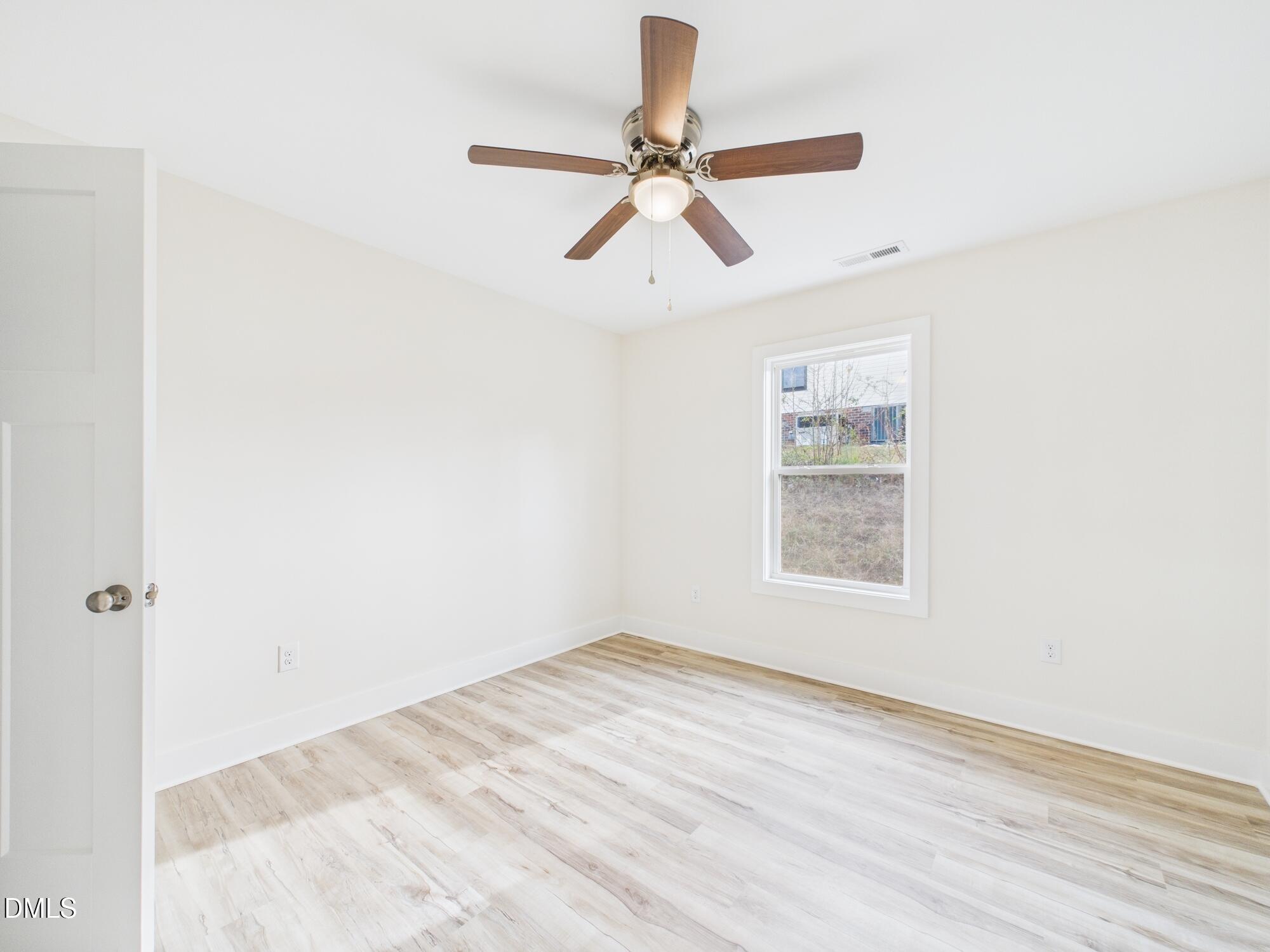 3602 Old Farm Court Graham, NC 27253 - Photo 19 of 25 a view of empty room with wooden floor