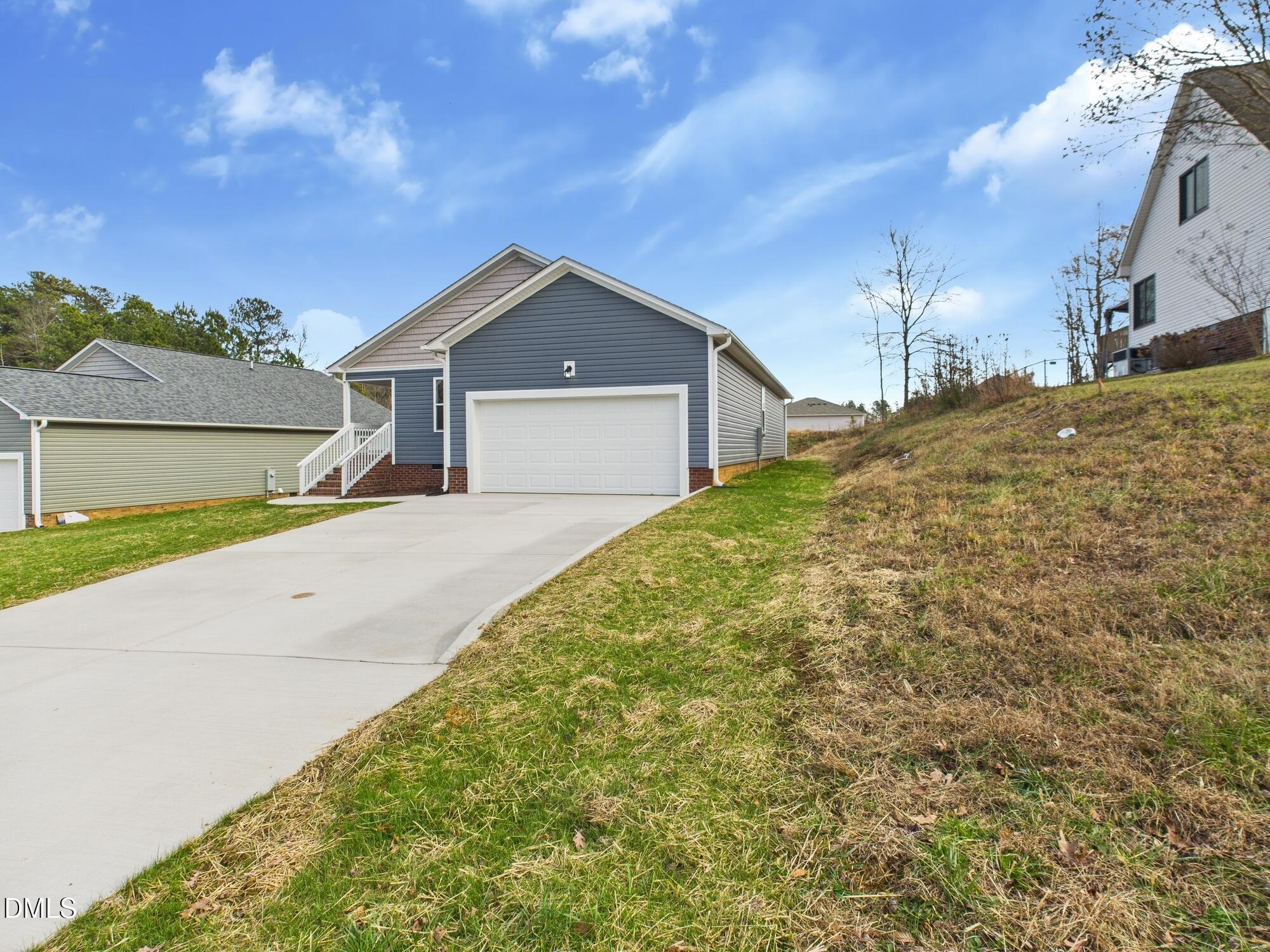 3602 Old Farm Court Graham, NC 27253 - Photo 20 of 25 a view of a house with a yard