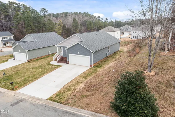 aerial view of a house with a outdoor space