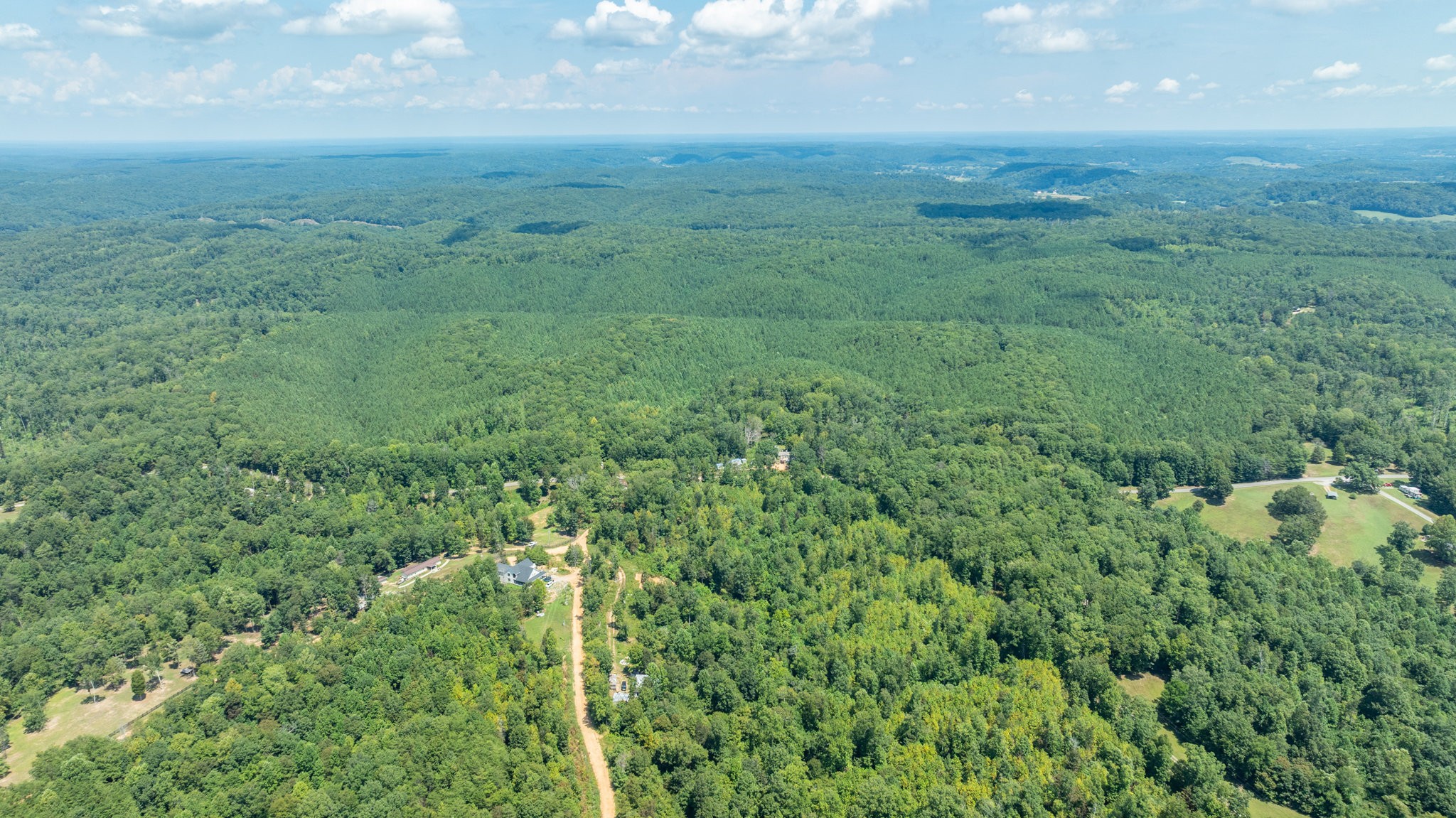 0 Ridgetop Road Hampshire, TN 38461 - Photo 22 of 72 a view of a green field with lots of bushes