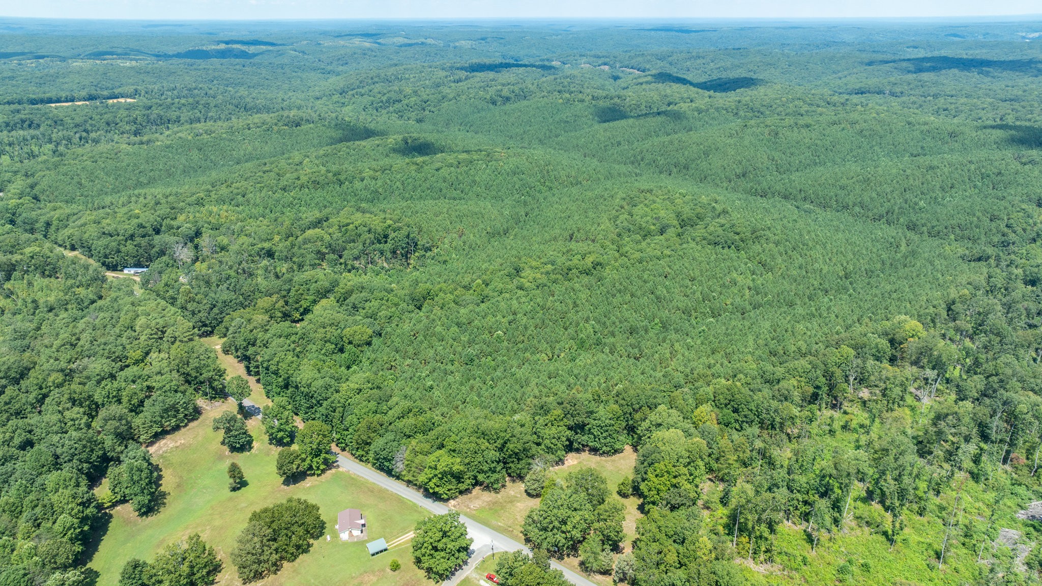 0 Ridgetop Road Hampshire, TN 38461 - Photo 27 of 72 an aerial view of residential houses with outdoor space and trees