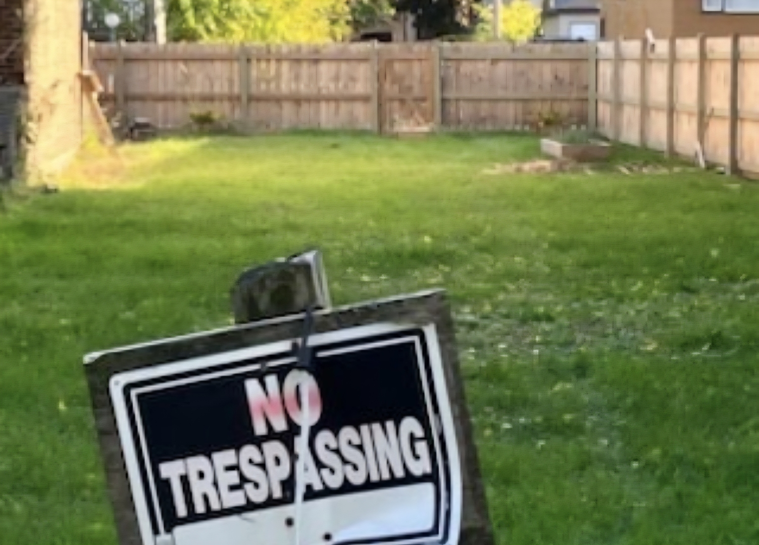 118 West 113th Place Chicago, IL 60628 - Photo 5 of 6 a view of a back yard