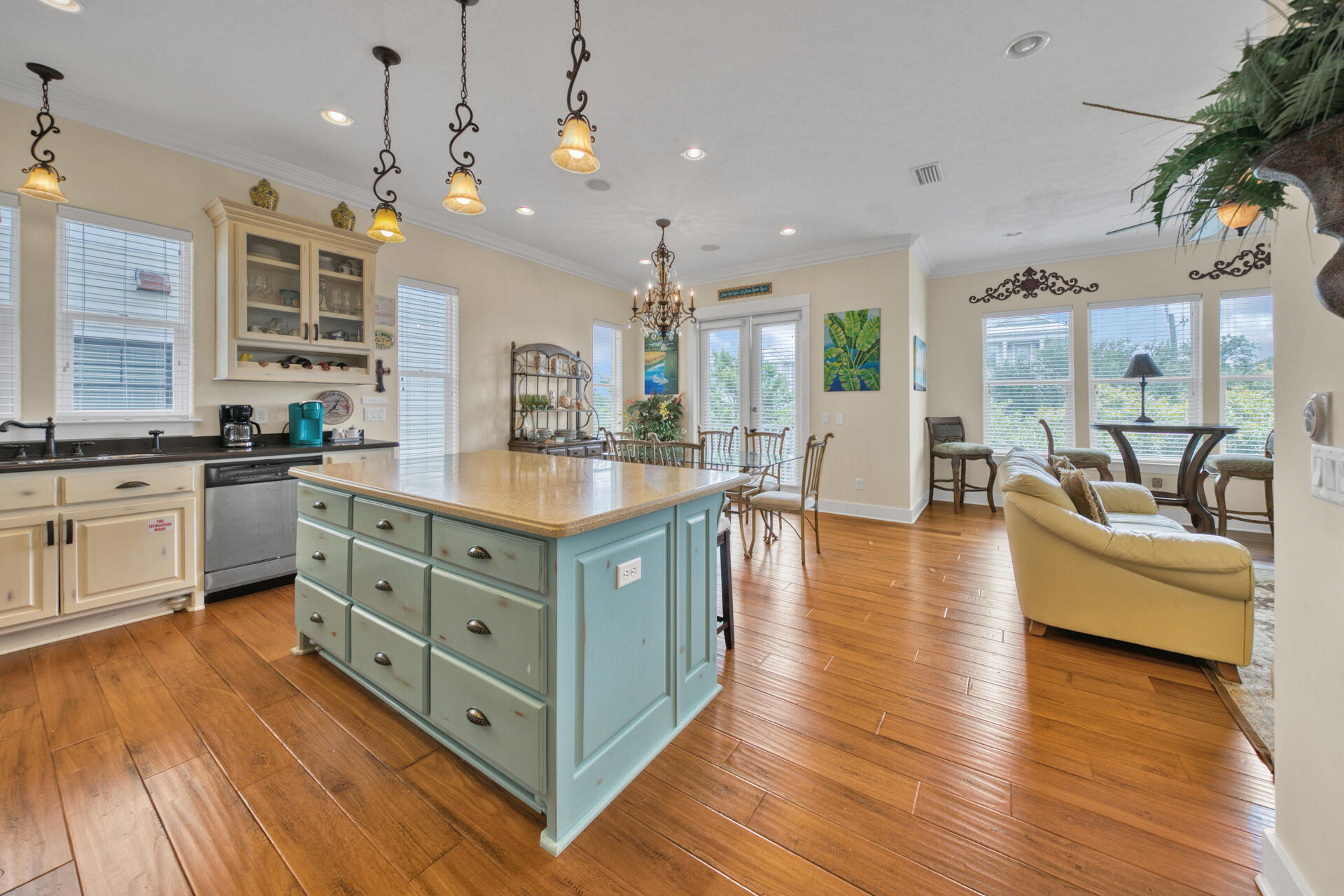 25 Pompano Place Inlet Beach, FL 32461 - Photo 12 of 76 a kitchen with stainless steel appliances granite countertop a lot of counter top space a sink and wooden floor