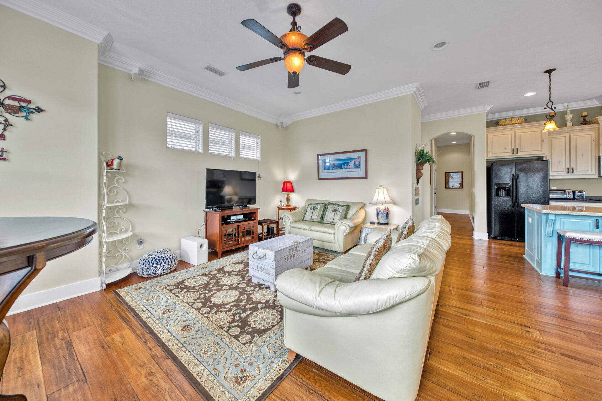 25 Pompano Place Inlet Beach, FL 32461 - Photo 16 of 76 a living room with furniture a flat screen tv and a fireplace