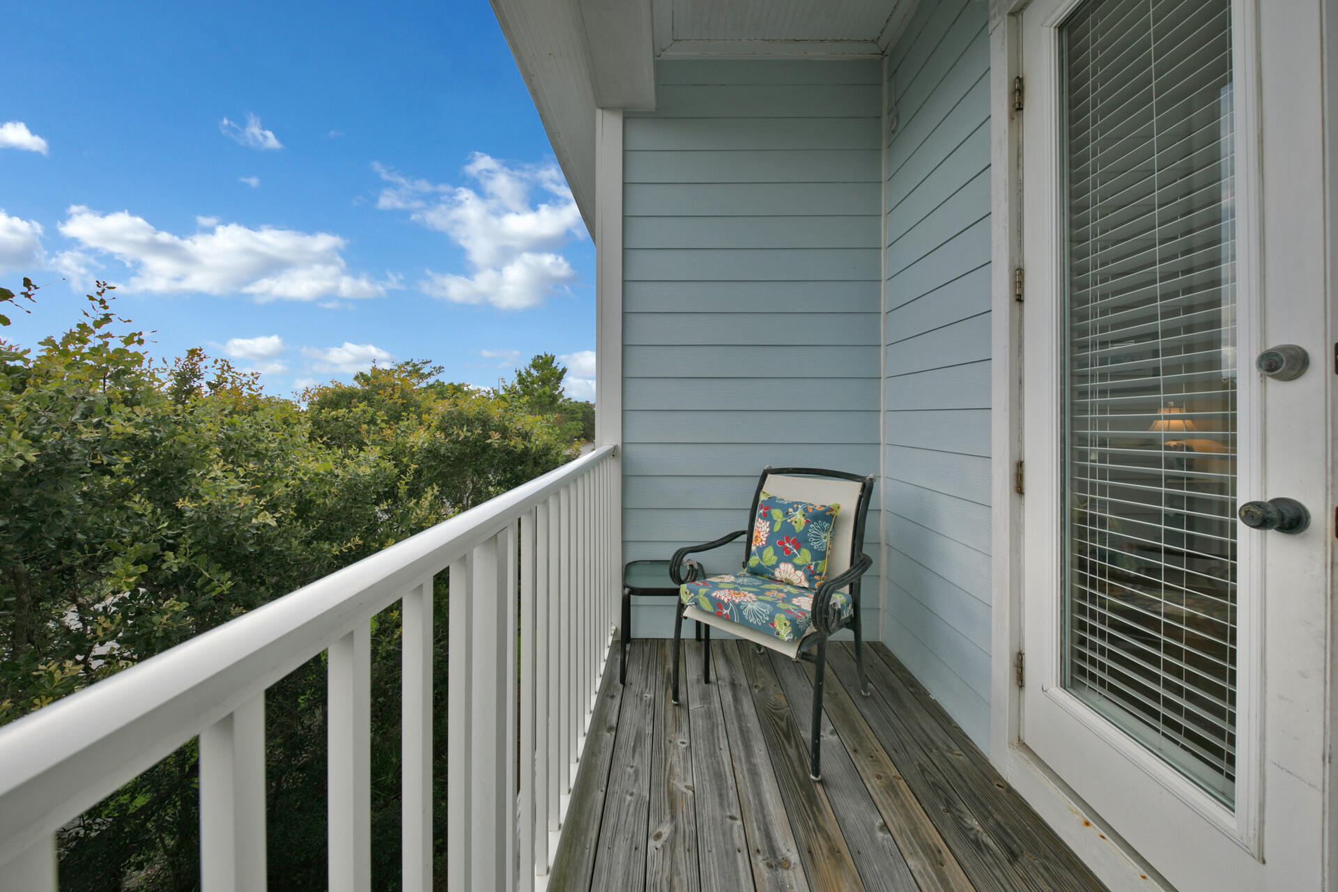 25 Pompano Place Inlet Beach, FL 32461 - Photo 31 of 76 a balcony with wooden floor table and chairs