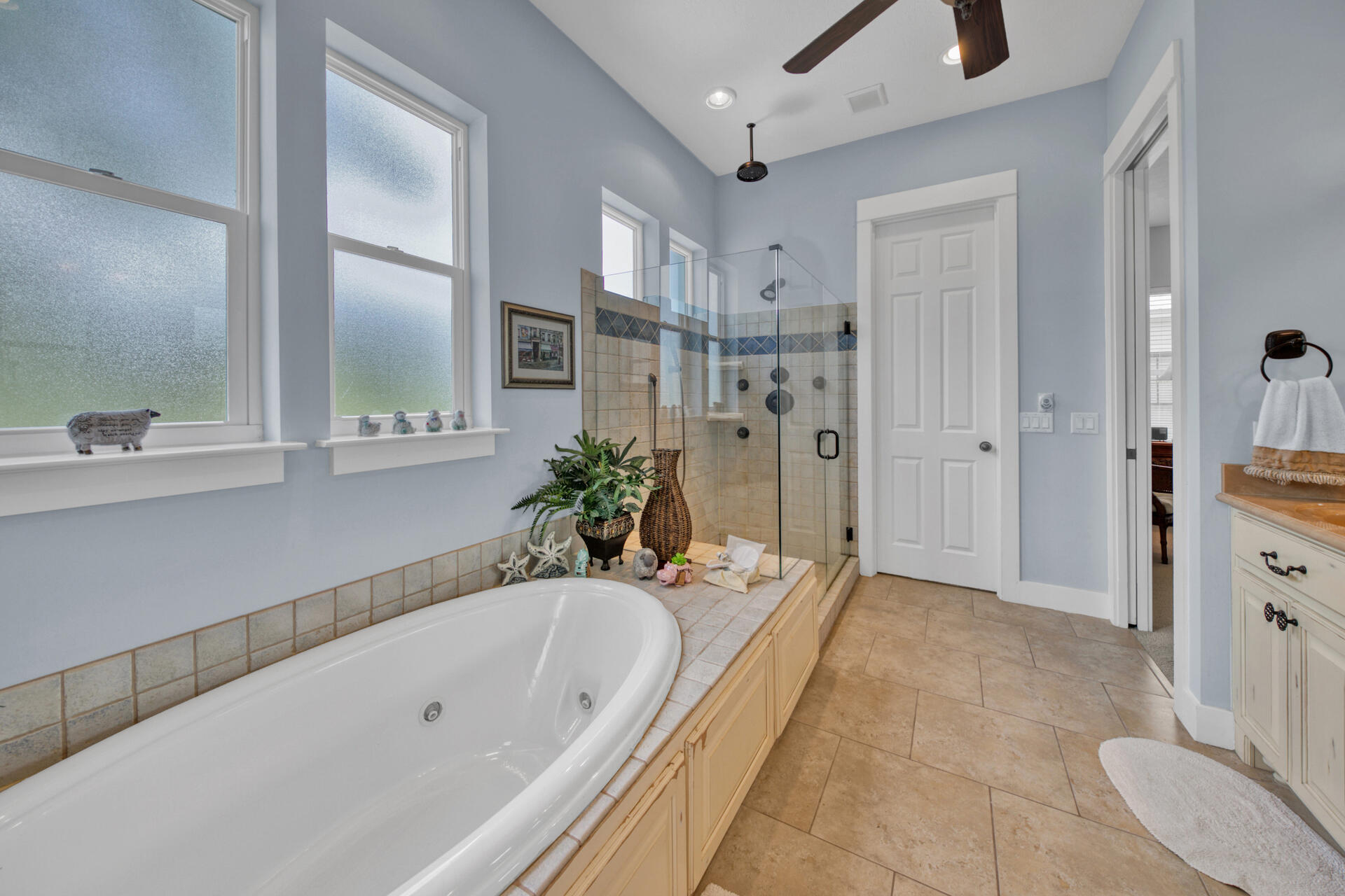 25 Pompano Place Inlet Beach, FL 32461 - Photo 35 of 76 a spacious bathroom with a bathtub sink and shower